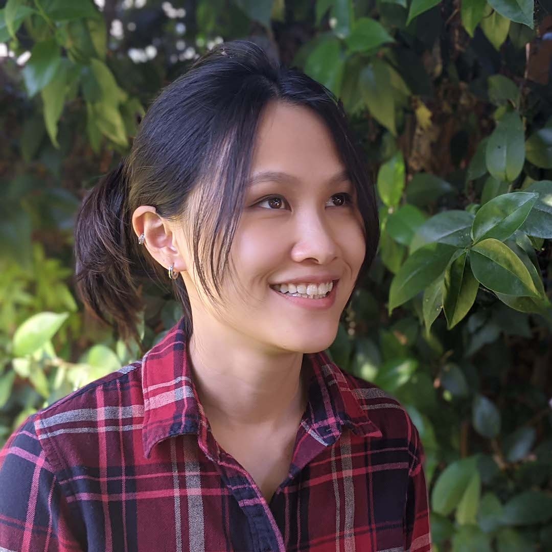 headshot of Josephine Wang wearing a plaid shirt